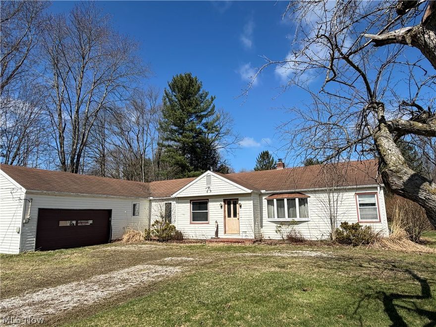 Single Family Ranch home on acres with a pond in Newbury Twp.  3 bedrooms, 1 1/2 bath in need of some TLC.