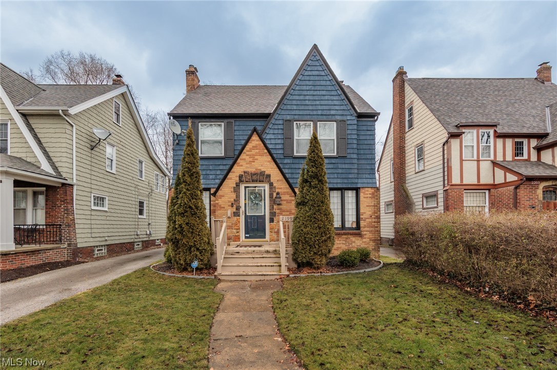 Charming and updated, 3-bedroom Colonial home nestled in the heart of University Heights offers a perfect blend of classic charm and modern convenience. The main floor features a cozy living room with a fireplace, creating a warm and inviting atmosphere. The kitchen has functionality with contemporary style. As you ascend to the second floor, you'll find three bedrooms, each providing ample space, natural light and stunning hardwood floors. The third floor offers additional versatile space, perfect for a home office, studio, or playroom. As you go downstairs find a partially finished basement, an ideal space for entertainment. Another fireplace in the basement adds a touch of coziness. This space offers flexibility, whether you envision a home theater, fitness room, or a comfortable family retreat. The home offers updates that seamlessly blend with its original character including hardwood floors, and crown molding. This Colonial gem is ready to welcome you home! Third floor has an additional 288 sq ft not included in the MLS.