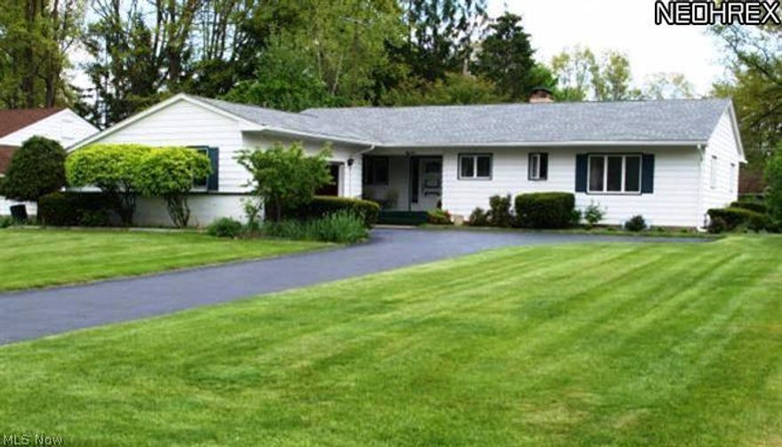 Easy one-level living in this NE ranch featuring spacious rooms throughout. New carpeting April 2013. Large open living room/dining room with lots of natural light. Sun room opens to back yard. Newer roof and gutters (2-3 years). Kitchen with eating area, newer appliances (2010), newer sink and faucet. Lots of closet and storage space throughout. Huge, furnished rec room on lower level with bar. First floor office/den with built-ins. Attached 2 car garage keeps you out of the weather from car to house. Call today for your private showing.