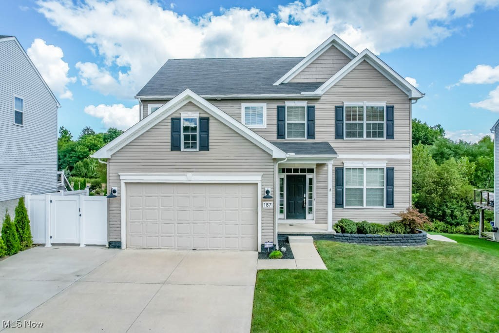 You’ll love this like-new one of a kind custom built colonial in the Woodridge Place neighborhood of newer homes, designed with a thoughtful layout that works well for families and for entertaining. A front entry with transom windows opens to a flexible space that can be used as a home office or den. Wainscot paneling and LVP flooring continue into the great room, where a vaulted ceiling and floor-to-ceiling stone fireplace connect with the eat-in kitchen featuring a center island with counter seating, white appliances, and a spacious walk-in pantry. A patio door extends the living space outside to a balcony deck, perfect for outdoor meals. The desirable main floor master bedroom includes a walk-in closet and private bath with a double sink vanity. Down the hall, you’ll find a guest bath and laundry room on the way to the attached two car garage. Upstairs, a loft provides extra space for a toy room or study area, along with two bedrooms that each have walk-in closets and share a full bath with an extended vanity. The finished lower level adds a rec room for movies and games plus walkout access to a covered deck and patio in the fully fenced backyard. Set on a prime lot that backs to wetlands yet close to shops, dining, and I-76, this is a special find you won’t want to miss. Come take a look and see it for yourself.