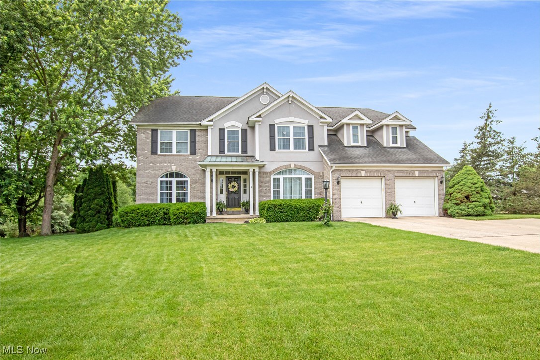 Welcome to this beautifully maintained 4-bedroom colonial in sought-after Wedgewood, offering serene pond access and an exceptional lifestyle, plus a home warranty for peace of mind! Step inside to find a bright, neutral interior with hardwood floors flowing through much of the home. The spacious eat-in kitchen features ample cabinetry, stainless steel appliances, and a center island—perfect for everyday meals or entertaining. Adjacent is the vaulted great room with a cozy gas fireplace, ideal for gathering or relaxing. The first floor includes a private office with French doors, formal dining room, comfortable living room, and a convenient laundry room (washer and dryer stay!). Upstairs, retreat to the vaulted primary suite complete with a walk-in closet and a luxurious soaking tub. You'll also find 3 additional spacious bedrooms and a hall bath. Additional highlights include: newer furnace (2024), newer windows (2020), cmposite deck overlooking a pond view back yard, a huge side yard, and an unfinished basement with endless potential. Located in the vibrant Wedgewood community with access to a clubhouse, pool, tennis courts, and scenic walking paths. This move-in ready home combines comfort, space, and style in an unbeatable location.