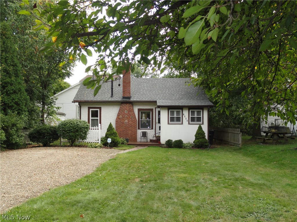 This 2 bedroom 1 bath home is as charming as can be! Sitting on the back of the lot offers a nice big front yard. Cozy living room with fireplace and formal dining room, nice sized kitchen and first floor laundry. Newer roof, windows & electric. Clean, neat and a pleasure to show!