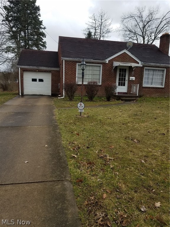 Two bedroom brick ranch with single attached garage. Basement has finished carpeted recreation room.