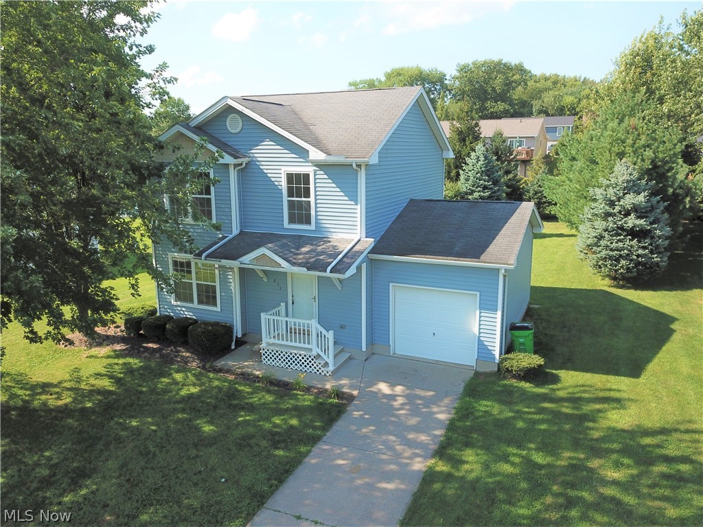 Welcome to 853 Grove Lane! This lovely 3-bedroom, 3-bathroom colonial home located in Orrville has desirable features throughout. Step inside the front door to see the living room with gorgeous premium flooring and a large window allowing the room to be illuminated by natural light. The premium flooring extends into the spacious eat-in kitchen and first-floor half bath. Sliding glass doors in the kitchen lead to a screened in porch overlooking the peaceful backyard. Head upstairs to find three sizable bedrooms and two full bathrooms. Clean, freshly painted basement. Don’t miss out on this beautiful home!