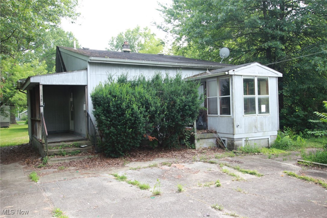 2 bedroom bungalow with a huge 1178 sq. ft. garage. This property needs a lot of work. 3 parcels, sold as-is.