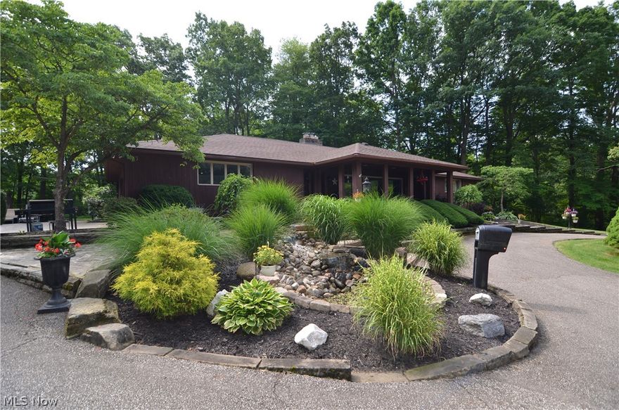 Private Mini-Retreat located in Silver Lake ready for you to call home. This PRIVATE GETAWAY sits on over 2 acres and features a sprawling deck with a hot tub and an outdoor fireplace. Complete one level living with 3 bedroom 2.5 bath and first floor laundry. 2 more fire places throughout the home.  Updated Chefs Kitchen featuring a gas cook top, double oven and ample prep space! Finished entertainment - game room in the basement with full kitchenette. Pool table and Foosball table stay. In addition to game room another finished space in basement could be a 4th bedroom.