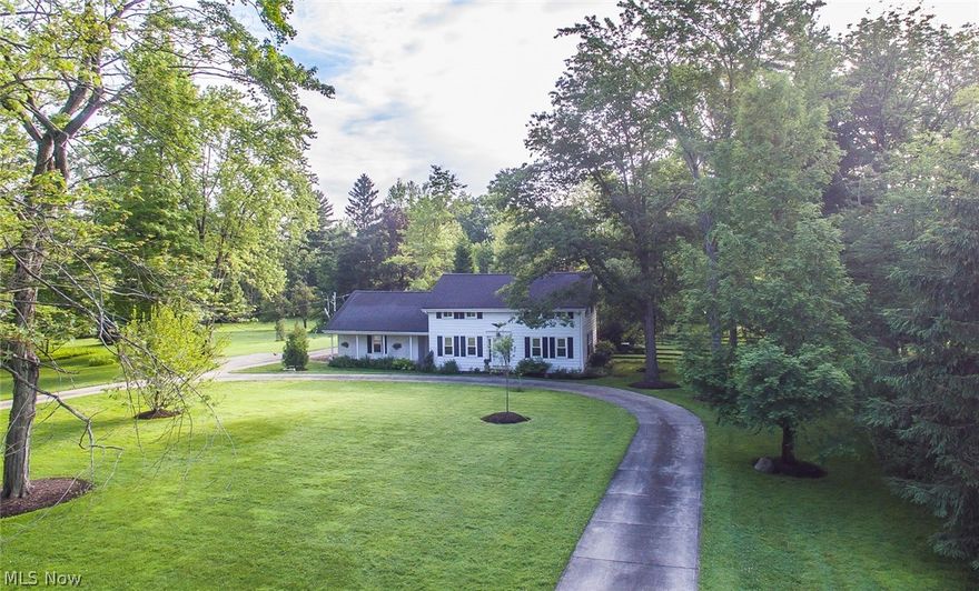 Just Voted The Best Suburb By Cleveland Magazine! Modern yet traditional home in a family friendly neighborhood on a private 1.2 acre lot minutes to Metro parks, restaurants and shops.  Home backs to horse property, offering privacy, and is low maintenance with a fenced in portion, grassy lawn portion and beautiful brick patio portion - it stuns!  Inside, a modern center hall is flanked by dining room and living room with fireplace.  Beautiful kitchen in the center of the home could be made to open to the dining or living room. Full package of stainless appliances, no maintenance stone counters and gorgeous hood over gas range.  Incredible 20' x 20' family room (added by current owners) with Pella windows and sliders.  Gorgeous master with en-suite featuring his and her walk in closets, custom tiled shower, 2 pedestal sinks and private screened porch!  3 additional well-sized rooms plus office space up. Hardwood floors under carpet upstairs. Nicely sized closets! 2nd full bath has deco