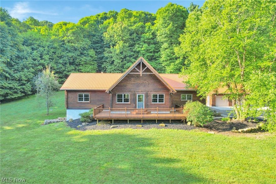 WOW! Fantastic views from the 38’ X 10’ front deck of this “AAA Full Round Log Home”!!! Large kitchen boasts a “movable” island, tons of cabinets, brand new granite counters & SS appliances which is open to dining area. The 2 story living/family room has beautiful Brazilian cherry wood flooring. Featuring 3 main floor bedrooms w/brand new carpeting & freshly painted walls. Large loft could be 4th bedroom/office/craft room etc. Full, unfinished walk out basement has 2,200 sq ft w/half bath just waiting to be finished! Lots of privacy & outdoor living w/10 wooded acres and a 70’ X 9’ covered rear deck plus a detached 3+ car garage w/electric & water. Only 36 miles to Intel, 18 Miles to Newark, 20 miles to Zanesville. New metal roof May 2024. Freshly stained exterior June 2024. Agent Owned…must see this one!