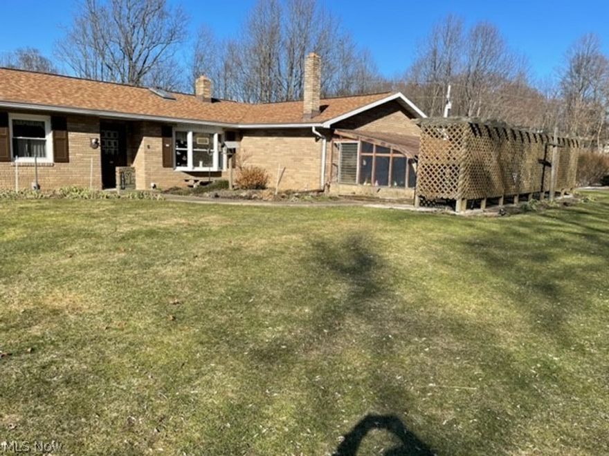 THIS WELL CARED FOR 4BR, 2BA BRICK RANCH FEATURES WHOLE HOUSE GENERATOR; FINISHED WALK-OUTBASEMENT WITH GARAGE AND DRIVEWAY; ENCORE FLOOR SEALER IN ATT. 2 CAR GARAGE; CORIAN KITCHEN COUNTERTOP, SINK; SKYLIGHTS FOR EXTRA SUNSHINE; MBR BALCONY; HAND-LAID PAVER
DRIVEWAYS; ATTACHED GREENHOUSE AND INGENIUS GARDEN WATERING SYSTEM; 2ND FLOOR OF18 x 26 BANK BARN OFFERS WORK SHOP AND STORAGE.