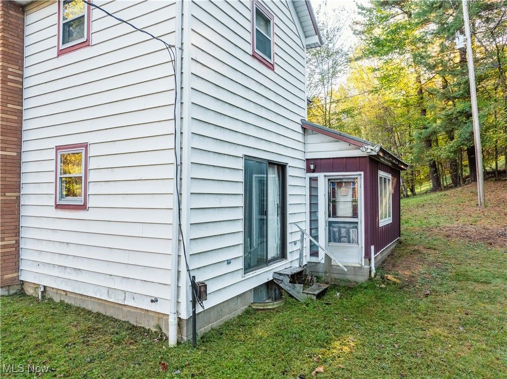 Photo of 6006 Echo Lake Road NE, New Philadelphia, OH 44663 (MLS # 5167654)