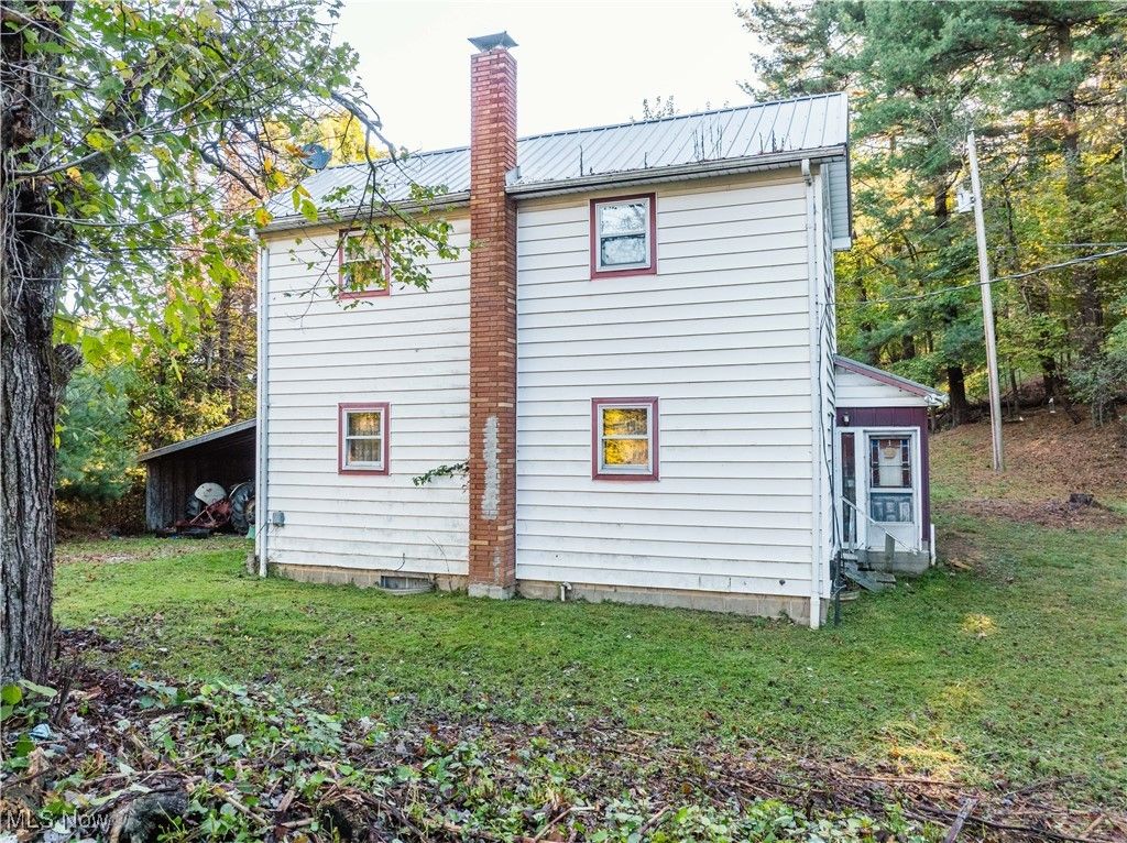 Photo of 6006 Echo Lake Road NE, New Philadelphia, OH 44663 (MLS # 5167654)