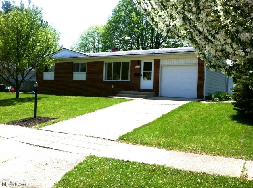 Well maintained Brick Ranch Style home in Stow features Newly refinished hardwood floors & paint! 3 bedrooms- one w/ custom built-in office space. Newly refinished bathroom!! Open kitchen & dining area w/ custom cabinets. A first floor 1/2 bath. Partially finished basement Great for a Rec Room, Large utility room w/ workshop space. Furnace Updated in 2010! The one car Attached garage opens to a covered patio w/ Attached shed and open backyard!