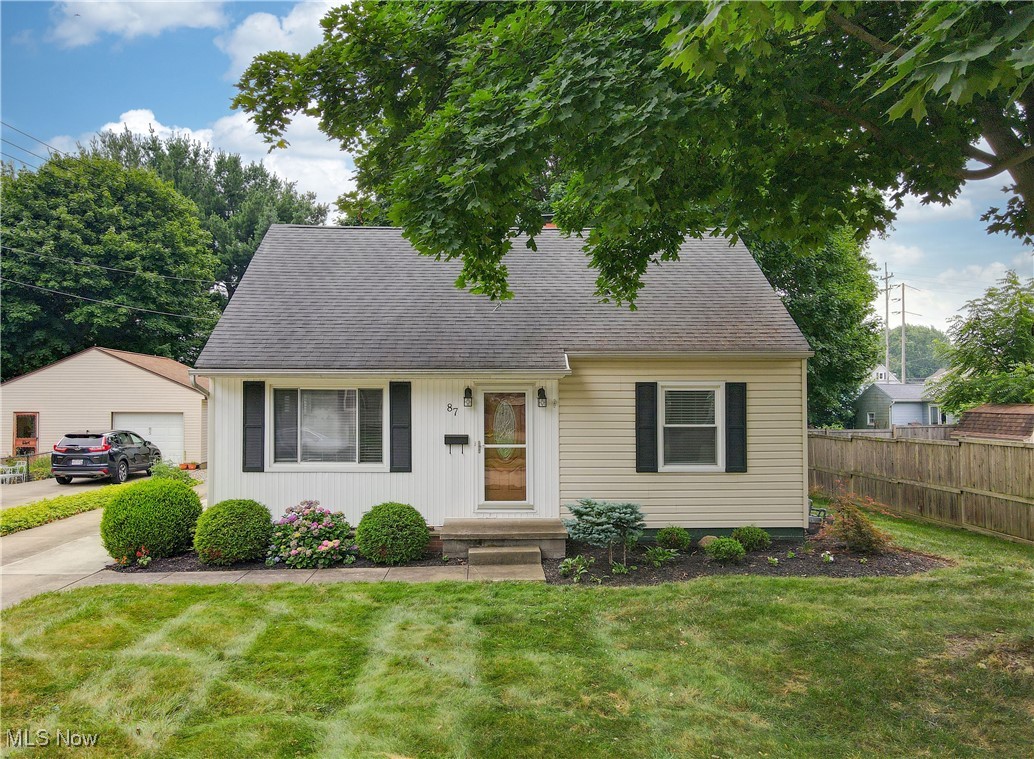 Welcome to this darling Cape Cod in the heart of Mogadore! This charming 3-bedroom, 2-bath home offers a warm and functional layout, including a spacious upstairs bedroom with an adjoining loft/bonus area, perfect for a home office, reading nook, or playroom. You’ll also love the added closet space on the second level for extra storage.
The heart of the home is the beautifully remodeled kitchen (2023), featuring quartz countertops, soft-close dovetailed cabinetry, and sleek new appliances—blending style with modern convenience. Additional updates throughout the home include new flooring on the main level, fresh paint, updated light fixtures, and select new doors.
Step outside to enjoy the patio located off the dining room, a spacious backyard with a large paved driveway and an oversized 2-car detached garage—ideal for vehicles, hobbies, or extra storage. This lovingly updated home is move-in ready and the perfect place to call home!