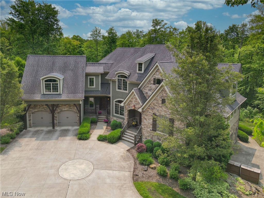 Welcome to your dream home! Located in Aurora, Ohio. This home is nestled on 10-acres and underwent a stunning remodel. This home is beautifully updated & spacious. The new kitchen boasts top-of-the-line appliances, granite countertops, & ample storage. The open-concept design flows seamlessly into the dining & living areas, creating a warm inviting space for entertaining guests. Enjoy the cozy living area with a fireplace & amazing windows & doors looking out to the river and hiking trails. With 6 bedrooms & 5 1/2 bathrooms, & a fully finished walk-out basement, this home is perfect for families of all sizes.
Some other highlights are the stunning horse barn, featuring a kitchen area & fireplace, a greenhouse that any arborist would love & a beautiful pond fully stocked with fish. Overall, this home is sure to exceed your expectations.