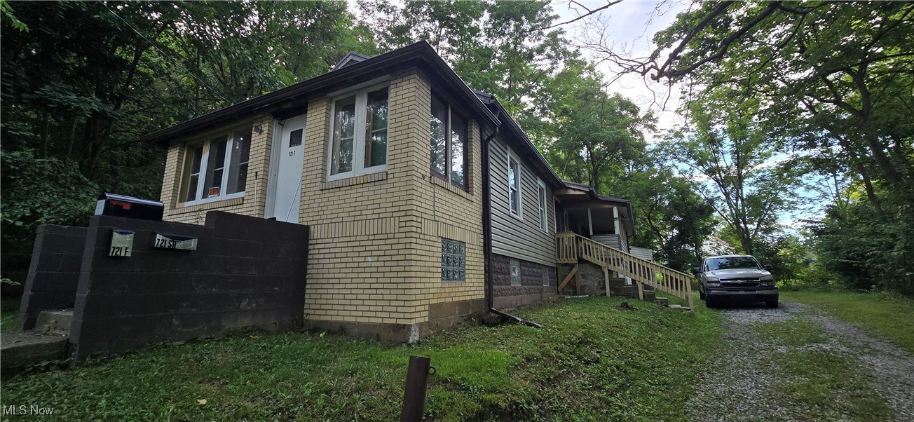 This versatile 2-unit ranch offers plenty of options, whether you keep it as an income property or easily convert it back into a single-family home. Thoughtful updates inside blend character with modern style, while a large porch, spacious turnaround driveway, and durable metal roof add to the curb appeal. New furnace too! Set alongside acres of neighboring woods, this property has a tucked-in feeling of privacy without being remote. A hidden gem ready to meet your needs.