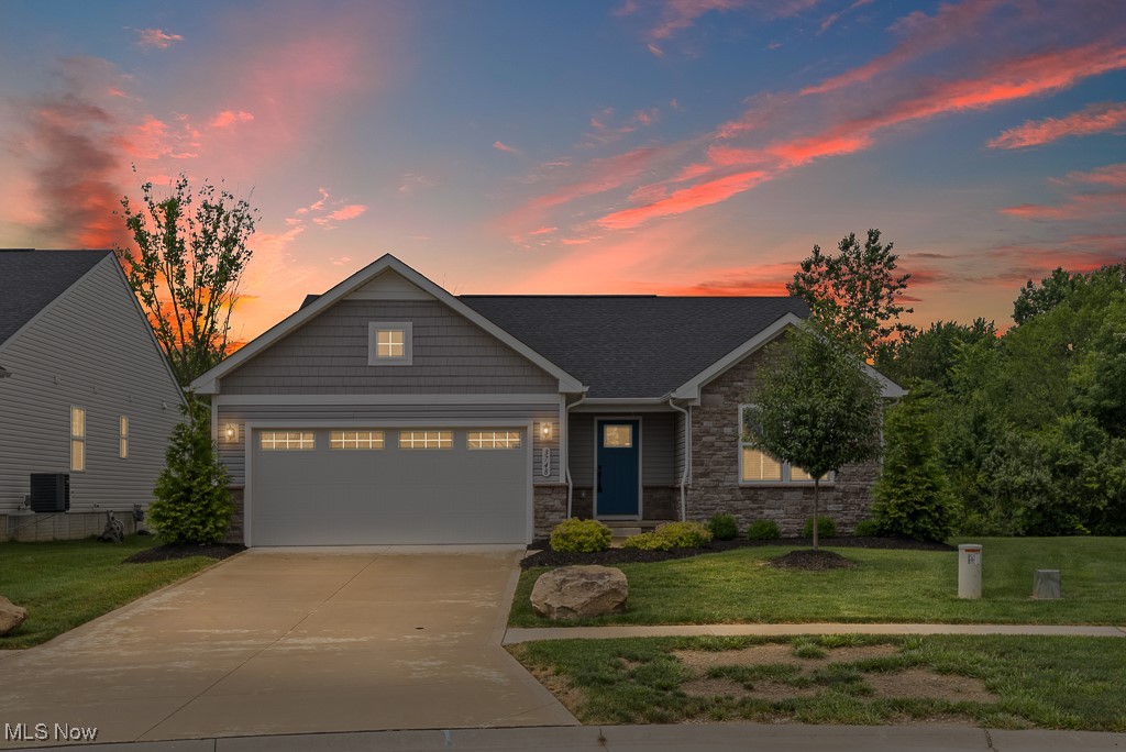 Welcome to this beautifully maintained 3-bedroom, 2-bath ranch built in 2022, offering over 1,300 sq. ft. of thoughtfully designed living space and a spacious 2-car attached garage. Enjoy the ease of first-floor living, featuring a bright and open layout perfect for both everyday comfort and entertaining. The heart of the home is the expansive kitchen, complete with white cabinetry, recessed lighting, a large island with built-in outlets, and seamless flow into the living and dining areas. Sliding glass doors lead to the backyard, where a stamped concrete patio provides the perfect spot to relax or entertain outdoors. The owner's suite offers a peaceful retreat with a walk-in closet, double sink vanity, and a stand-up shower. Additional highlights include carpeted bedrooms, a convenient first-floor laundry room, and a full open basement ready to be finished to suit your needs—ideal for a home gym, theater, office, or recreation space. Modern, move-in ready, and full of potential—don’t miss your chance to make this home your own!