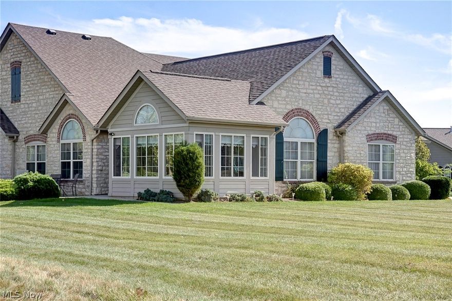 Amazing View/Setting at this Special Villa's Location, Live the Resort Lifestyle! Play Golf at CIC's Arthur Hills Designed Championship Golf Course! CIC Membership is Reasonable and only a Golf Cart Ride Away to Lake Erie and all its amenities. Popular Canterbury Floor Plan private location right on golf course in a 2 unit building with large private driveway. Offers 2 Bedrooms, Den/3 rd Bedroom, Sun Room and 2 Full Baths. Updates include Granite Countertops, Tile Flooring in sunroom & kitchen. Almost 1,900 Square Feet with Vaulted Ceilings and an Abundance of Windows throughout. Just a short walk to the Community Center with Fitness Facility and Heated Pool.  Don't miss this opportunity!