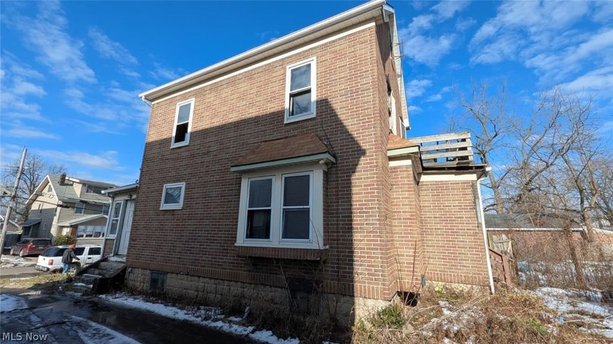 INVESTOR ALERT: High-Yield Potential in Akron Opportunity Zone. This 3-bedroom, 1.5-bathroom Colonial is a strategic addition to any portfolio, offering a blend of immediate rental demand and long-term appreciation. Featuring a spacious 1,445 sq. ft. layout, this property boasts a formal dining room, an enclosed front porch, and a full basement/attic—perfect for value-add finishing to increase equity.

Situated minutes from the University of Akron and major medical hubs, the location ensures a consistent tenant pool. Key updates include a 1-car detached garage and a paved driveway. Whether you are looking for a turnkey rental or a light-rehab flip, 417 Margaret St offers the robust fundamentals investors prioritize. Low taxes and high rental comps in the 44306 area make this a standout opportunity. Sold as-is.