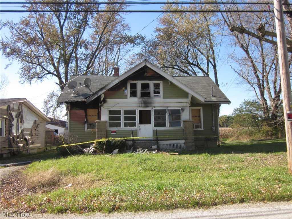 Home was in a fire. Selling "AS-IS" condition. Severe damage on first floor. Does include a 2-car detached garage.