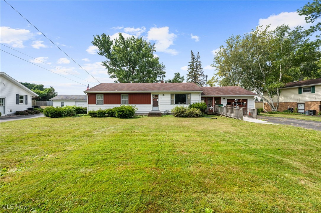 Don't miss this great opportunity to own a solid 3 bedroom, 1 bath ranch on a beautiful lot in a desirable Painesville Twp location. This home offers a spacious living room filled with natural light, an inviting dining area, and a generously sized kitchen with plenty of room to make your own. All three bedrooms and the full bath are conveniently located on the main floor. Hardwoods lie beneath the carpeting throughout, just waiting to be uncovered and restored to their original charm. The full, unfinished basement offers a blank canvas for additional living space, storage or a recreation area - whatever suits your needs. A breezeway with access to the rear yard connects the home to the one car attached garage, which features a newer concrete floor. With great bones, a fantastic layout, and a lovely yard, this home has all the right ingredients for a smart investment or forever home. Bring your vision and make it yours!