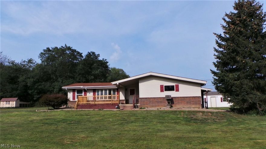 Welcome to your new country home close to town. 2808 Sq. Ft of finished living space with 2.69 acres of land, a 2 car attached garage with drain, electric and water, a pond, insulated dog kennel two years old, dog house, chicken coop. Beautiful custom kitchen with plenty of storage and counter space  with pull out cabinets and ceramic tile floor. The remaining upper level with bamboo flooring and master bedroom with private bath. The lower level is completely finished with a second kitchen, full bath, 2 bedrooms, family room with recessed lighting fireplace all  laminate floors on lower level. Lower level has a private entrance so could easily be  separate living or a great entertaining level.  Windows and appliances 2 years old. New pressure tank 2017, hot water tank 2016, furnace 10 years old, propane heat, 120 gallon retention tank, water softener system, reverse osmosis in kitchen. A home you must come in and see.