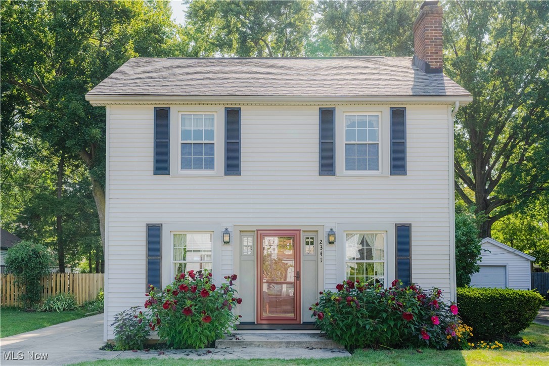 Welcome to this charming three-bedroom, one-and-a-half-bath home nestled in Cuyahoga Falls. Upon entering, you will appreciate and love the delightful curb appeal! As you step inside, you’ll find a cozy living room featuring lovely built in shelves surrounding the fireplace, perfect for snuggling up in the colder months and perfect for relaxing. The main level also includes a formal dining room that opens to a lovely covered patio/sunroom out back. The fully-applianced kitchen has plenty of cabinet space, with a convenient half-bath nearby. Upstairs, you’ll discover three spacious bedrooms with hardwood floors, and all have ceiling fans. Additional highlights include a newer hot water tank from 2021, newer windows, a two-car detached garage, and a partially fenced-in yard. Plus, the location is fantastic, just minutes from Front St and all that has to offer, with easy access to restaurants, shopping, and the freeway! One Year Home Warranty Offered. You do not want to miss this one, call today to schedule your private showing.