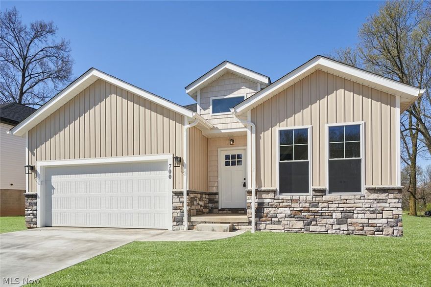 Welcome to this stunning, newly constructed 3-bedroom, 2-bathroom Hahn Home in the heart of Doylestown, OH. Step inside to discover luxurious vinyl flooring that invites you into the spacious great room boasting vaulted ceilings and ample natural light. The contemporary kitchen features stainless steel appliances, quartz countertops with a generous island, and a spacious dining area complemented by a glass sliding door providing seamless access to outdoor entertainment spaces. The first floor also hosts a generously sized owner's suite with vaulted ceilings, a walk-in closet, and an en suite bath featuring a double sink vanity and tiled shower. This home is located minutes from downtown Doylestown, parks, schools, highway access, and more! Schedule today for a private showing.