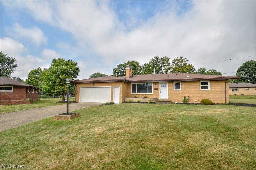 Welcome home to this beautifully updated top to bottom all brick ranch located on a cul-de-sac in desirable Austintown Schools. This tastefully decorated home boasts an impressive new kitchen with granite counter tops, hardwood floors throughout and a stone fireplace. The main bath includes a ceramic tile surround in the shower. There are new windows and doors throughout, as well as new light fixtures. The sliding glass doors lead to a covered porch and lovely backyard. The basement is partially finished with a full bath and was just recently waterproofed. The warranty is transferable. Just move right into your new home. Broker owned.