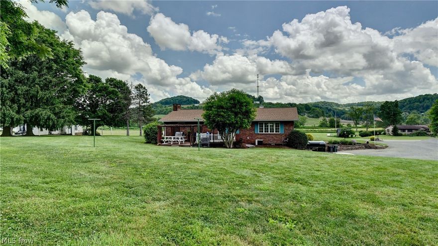 Rare find! Brick ranch on 9 acres just outside of town! This spacious home has 3 bdrms and 1.5 baths on the main level.  Updates include new furnace (23), new 200 amp panel and tankless water heater (24), and newer roof. All kitchen appliances stay as well as washer and dryer.  Lower level has large family room with woodburning fireplace and office.  Outside is a mix of wooded and open acreage with lots of deer.  Goat fence can be negotiable if new buyer decides.  Chicken coup/shed to stay.  Check out this beautiful country property!