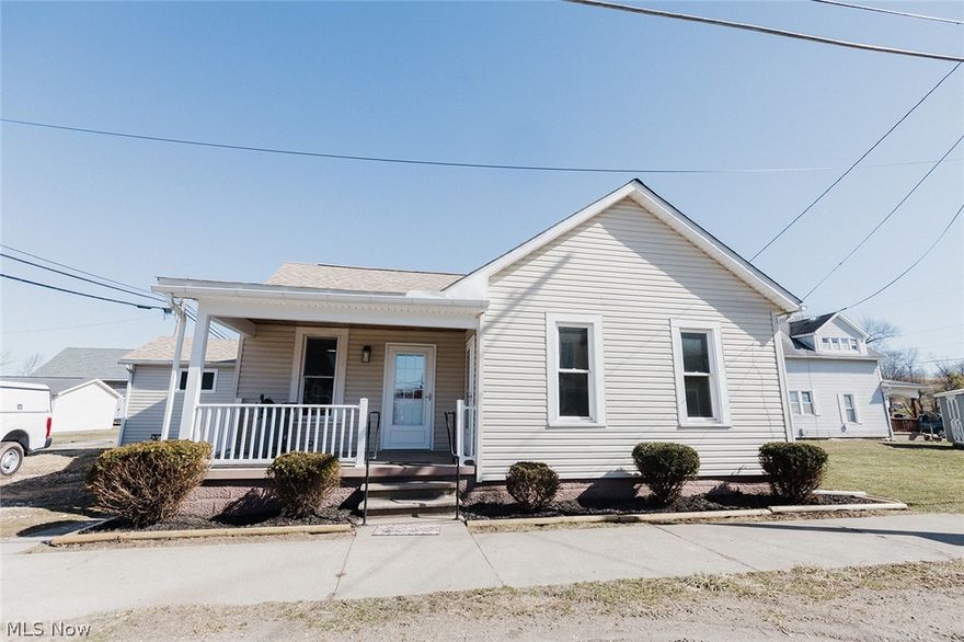 ALMOST BRAND NEW home now has 3 BEDROOMS and 2 FULL BATHS and SUPER CLOSE TO VILLAGE PARK!  This meticulous owner has renovated this one floor plan home to include a beautiful kitchen and dining area with breakfast bar, hickory cabinets (with lifetime warranty), newer stainless steel appliances, and Quartz countertops. A large living room allows plenty of room for entertaining.  The laundry area is conveniently located in the wide hallway near two of the bedrooms.  New roof, central air, ductwork and insulation in the attic, all new lighting, updated plumbing and wiring, new entry and storm doors, LVT flooring, plus beautifully stained woodwork and doors throughout.  3rd bedroom with high wood ceiling could be used as a family room. Gas stove, hot water tank, and newer gas furnace. Enjoy your morning coffee on the covered front porch while waving at the friendly neighbors going by.  Many high-end renovations will make you proud to call this your home.  Select your bedroom carpet with seller giving a carpet allowance with an acceptable offer.