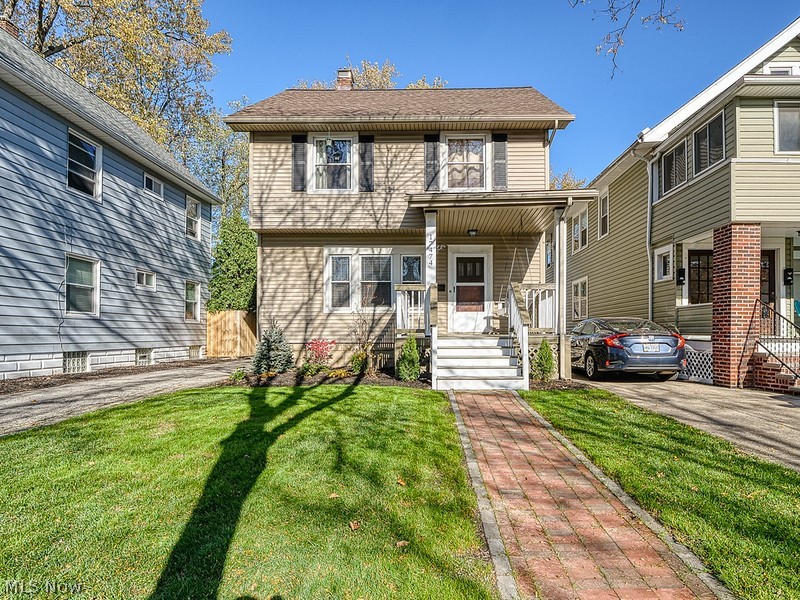 This beautiful Western Lakewood colonial is loaded with updates and charm! Enjoy all the curb appeal with a newly landscaped yard, and cozy front porch to relax on. The fully fenced in backyard is perfect for entertaining, with a great size deck, and tons of green space.. you will fall in love. Inside, on the main level you will appreciate the great hardwood floors throughout the main level! As you relax and enjoy meals in the dining room, you will enjoy all the character and charm, the gorgeous built in cabinets, and an open concept into the updated kitchen. The second level features a LARGE master bedroom with hardwood floors and great space. The updated full bath with greet you in the hall and onto the second bedroom which is a perfect rec room/ office! Follow on up to the second bedroom that features excellent space and a cozy loft! The lower level features a partial finished basement and second full bath! With a new roof and Ac, this will go FAST!