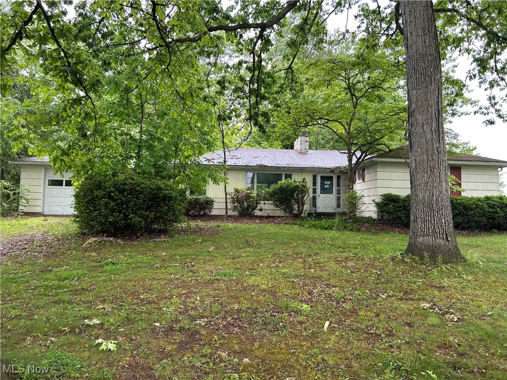Come check out this 3 bedroom Ranch in a fabulous Jackson Township location. The gorgeously treed lot measures just over 3/4 of an acre with easy access to 77 or 21. Bring your imagination to bring this home back to its original glory. Sold as-is.