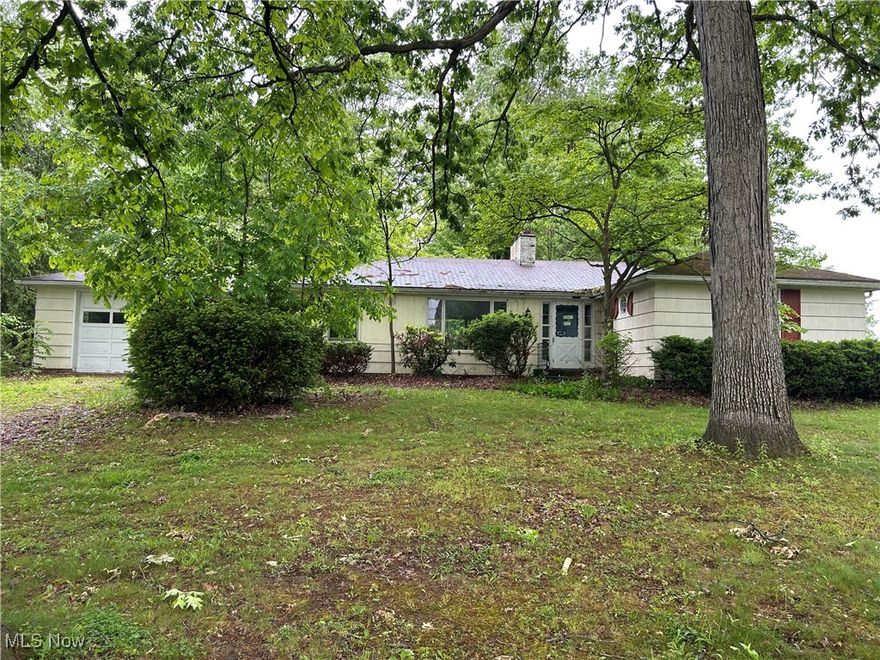 Come check out this 3 bedroom Ranch in a fabulous Jackson Township location. The gorgeously treed lot measures just over 3/4 of an acre with easy access to 77 or 21. Bring your imagination to bring this home back to its original glory.  Sold as-is.
