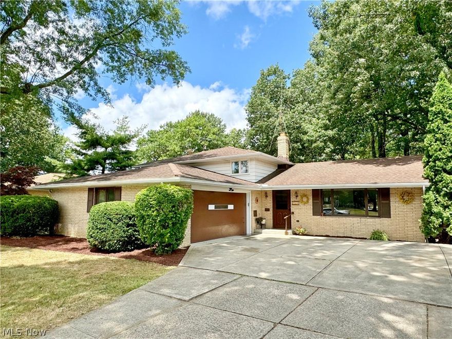 4-bedroom split level in Seven Hills with over 2800 sq ft! This well maintained and long-time family-owned home has so much to offer. Walk inside to a spacious living and formal dining room, with sliding door access to the backyard. Continue around for easy access to the kitchen, with plenty of room to eat-in, leading to both upper and lower levels. Head upstairs to 4 spacious bedrooms with hardwood flooring, and 2 full bathrooms! Including a master bedroom with a private bathroom! Head down to the lower level, featuring a large and cozy family room with a gas fireplace, AND an addition with walk-out access to a serene back patio and large deck! Enjoy a beautiful and private wooded backyard surrounded by gorgeous trees. The addition can be used for so many purposes. 5th bedroom, an office, additional living space, whatever you need! Direct access to a 2-car garage. Minutes to local eateries and attractions! Seller including home warranty! Motivated Seller! Bring offers!