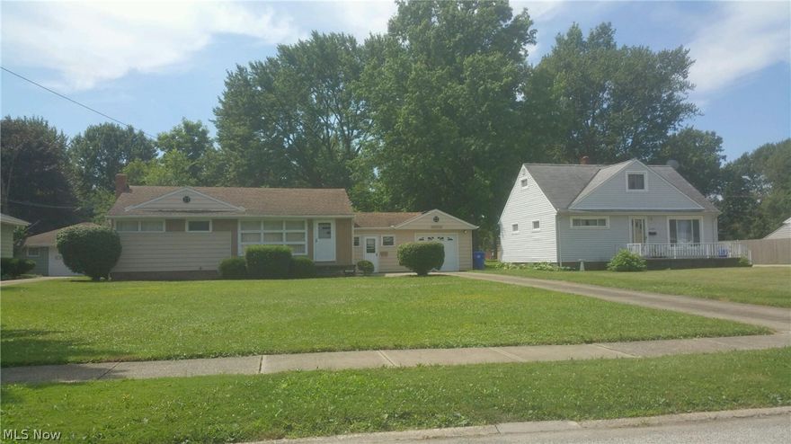 Great street in Brook Park! 2 bedroom ranch with sun porch on park-like fenced yard. Large eat-in kitchen. Bedrooms have new carpeting. Attached garage and breezeway. Home needs updating. Being sold "as is" to settle estate.