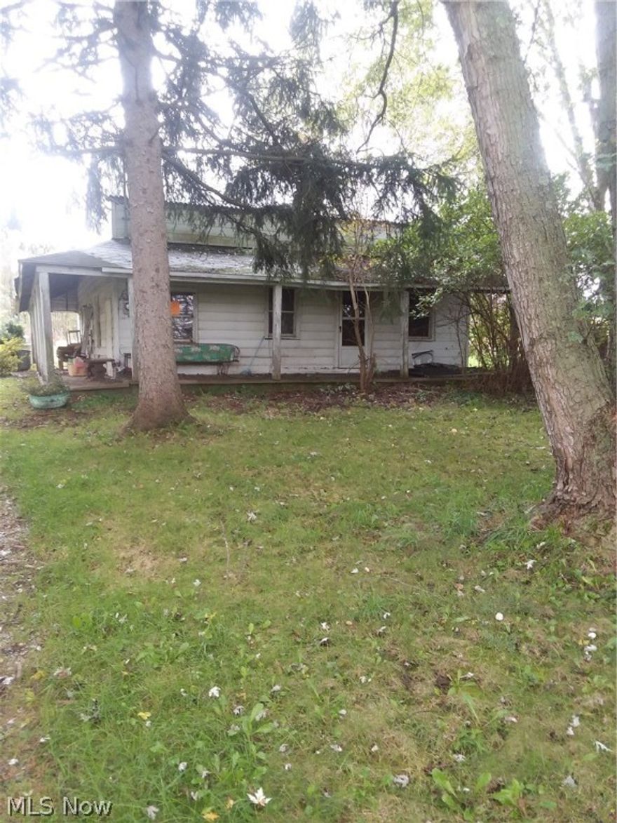 This is a land value sale.  House is in poor condition and is condemned.  Lot is almost 2 acres and in an area of very nice homes.  Well and septic on property.