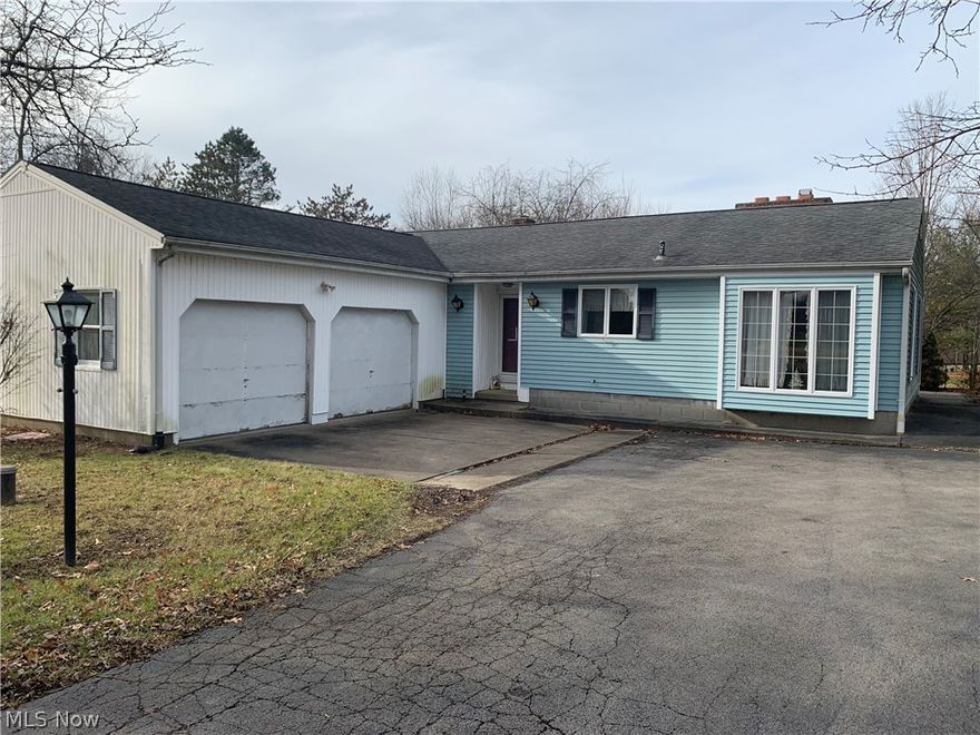 Great location! Quiet, peaceful, country setting just minutes to everywhere. Large corner lot. 2 bedroom, 2 bath ranch home with a 1st floor utility room. Kitchen has an eating area and a formal dining room, living room with fireplace and built-ins, 2 car attached garage, and partial basement. Home warranty provided!