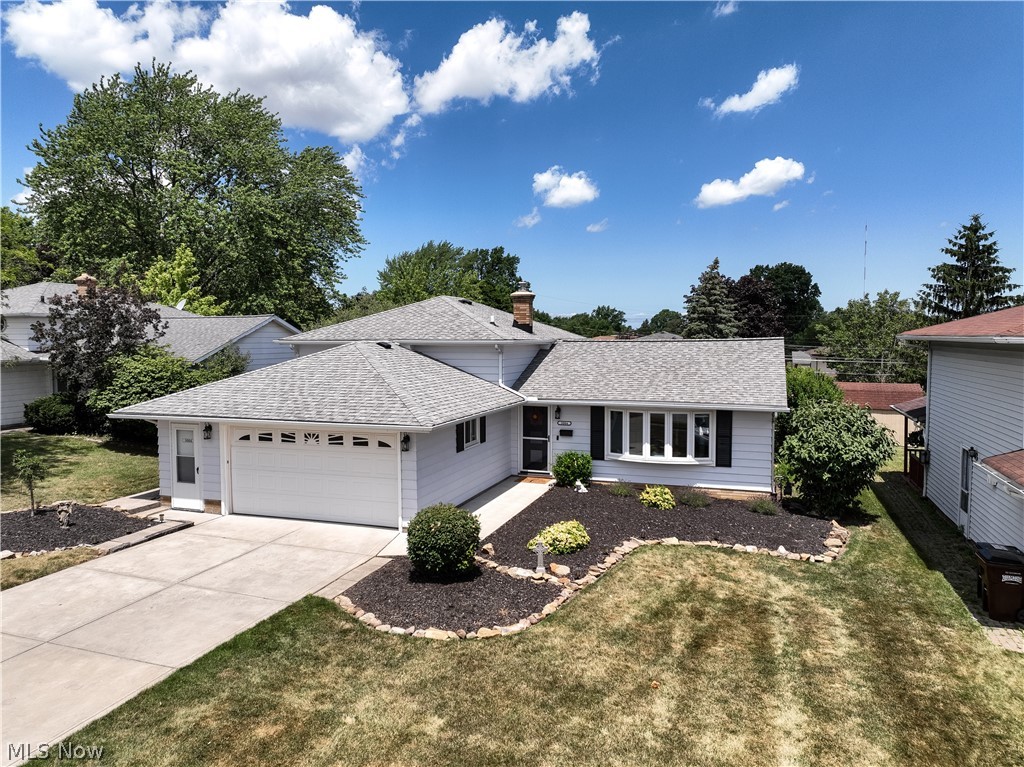 Get ready to be WOWED by this METICULOUS Home in the southern end of Parma! COMPLETELY UPDATED & a SHOW-STOPPER Inside & Out! The Curb Appeal draws you in w/newly landscaped yard & newer Concrete. As you enter, the Foyer Greets You W/Refinished Hardwoods in the Living & Dining room. The COMPLETELY UPDATED KITCHEN is Nothing Short of AMAZING & features Stainless Appliances that STAY, Updated Cabinets & Hardware, Granite Counters & a Large Island; Perfect for Extra Seating & Entertaining! Check out tose Lighting Fixtures, they're SPECTACULAR! 3 Large Bedrooms w/Gorgeous Refinished Hardwood Floors! Full Bath IS Completely Updated! The Lower Level features an Updated 1/2 Bath & plenty of room for everyone in the Family Room. A Fully Enclosed 3-Season Sunroom off the Dining Room is a Bonus for sure & leads to a Spacious Cement Patio w/Built-in Grilling Station & New 14x10 Shed to store all your outdoor toys & extras! Another Bonus is the Large Crawlspace under the entire main floor for ampl
