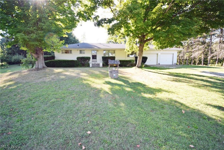 Don't miss out on this Ranch in Norton with over 2 acres of privacy! Step in from the attached 2 car garage to the spacious family room with wood burning fireplace perfect for cold weather.  Three bedrooms and one bath.  Relax and enjoy the private views of the enclosed sun room. This property also includes a large barn ideal for a work area, storage, or both!  Call today to schedule your showing.