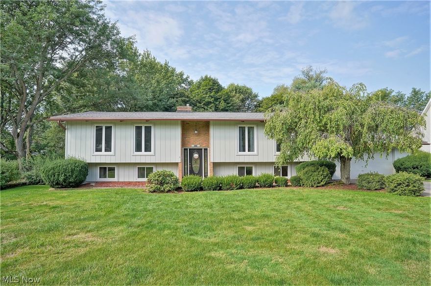 Gorgeous 4-bedroom home situated on a beautiful lot with tons of space for activities! Make your way through the inviting entryway to the first floor which features updated LVP flooring throughout the living room, dining room, and kitchen. The large master bedroom with a walk-in closet and access to the bathroom. Down the hall are 2 more bedrooms. The lower level features a spacious family room with gas fireplace and doors that open to the brick patio. You will also find the recreation room with access to the garage, a fourth bedroom, and a full bathroom. Sit on the deck that overlooks the large backyard with views of the creek. This is truly a home that offers everything you need! New roof installed 2020, AC 2021, Water tank 2020, Dishwasher & disposal 2019.