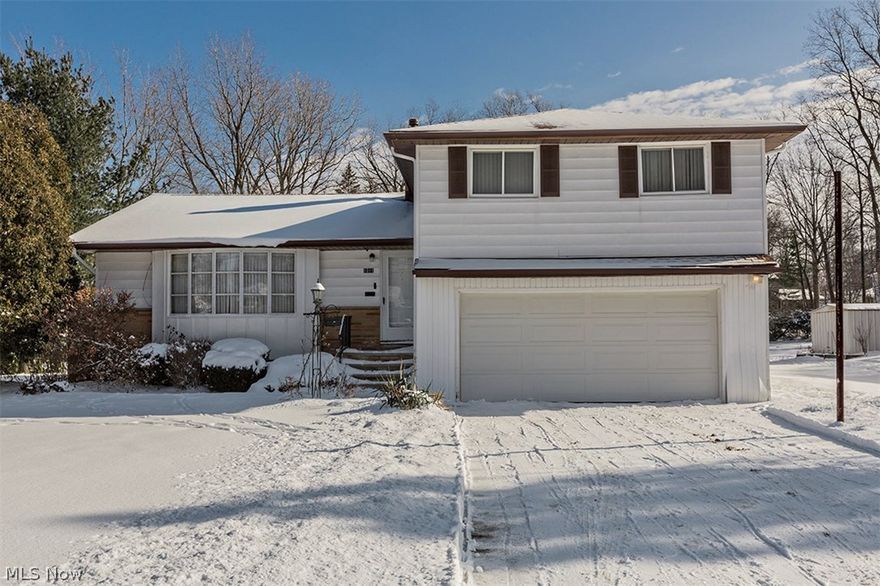 Welcome to this nuetrally well maintained 4-level 4 bedroom split level home in Highland Heights! One of the most amazing features is the wooded deep back yard just shy of half acre! As you enter into the main level the living/great room offer vaulted ceilings, large bayed picture window which boasts tons of natural light. The living/great room is open to the dining room which also offers sliding doors and great views of the back yard. The kitchen offers built in oven, gas stove top with all appliance staying. This completes the main level. Off to the four nice size bedrooms. The inviting master bedroom has a half bath and nice sized closet. Three additional bedrooms and updated full bath complete the upper level. As you enter through the garage and a few step down from the kitchen is a family room with sliders to the wonderful backyard. Also this floor offers another half bath and a huge closet. The lower level could be finished for extra room such as a rec room, hobby room or worksho