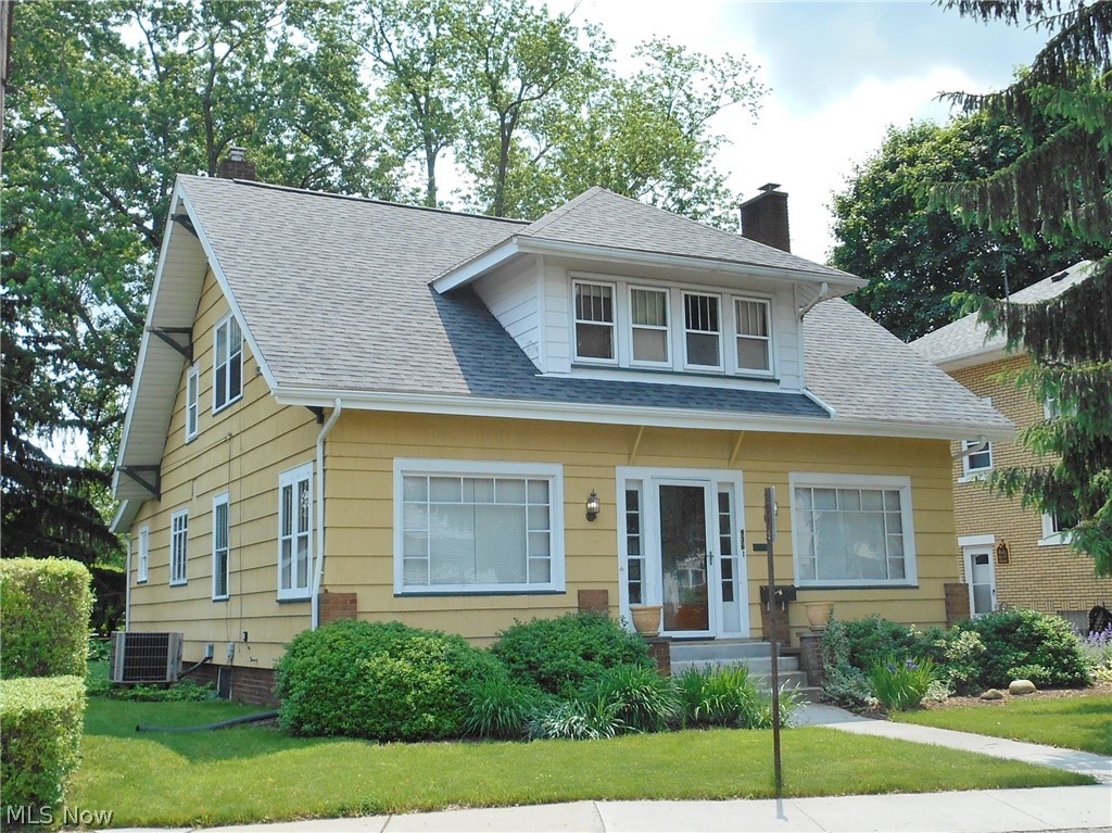 This move in ready well maintained Craftsman home in a park like setting with a 2 stall detached garage and a shared new concrete driveway. Convenient North East Massillon location close to park and shopping is ready for new owners. The first floor has a large eat in kitchen with a walk in pantry, formal dining room with beautiful coffered ceiling, living room with fireplace and built in bookcases, additional 12X12 TV room plus the 4 season front porch with a half bath complete the first floor. The second floor has 3 bedrooms with large closets and a full bath. The lower level is partially finished with a half bath and plenty of storage. The roof was new in 2018 and every room has fresh neutral paint. America's Preferred Home Warranty is included for your peace of mind.