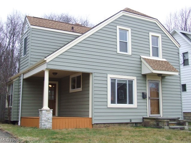 Beautifully updated 2-bedroom Colonial with open floor plan. Living room is open to dining area with window seat, two closets, large window overlooking brick patio and back yard, and door to side/front porch. Kitchen with granite squares countertops, breakfast bar, beautiful newer cupboards and roped crown molding. Upstairs the roof has been raised to allow both bedrooms and the glamour bath to all have their own cathedral ceilings. The bathroom has ceramic floor, jetted tub, step-in shower with built-ins and updated vanity with synthetic marble countertop. Roof and windows are about 10 years old, furnace and central air/heat pump are about 5 years old. Electric is 200 amp. ALL appliances stay, including washer and dryer. Basement has been waterproofed and there are glass block windows. Whole house is electric, including all LED or high efficiency bulbs! Woods behind you provide extra privacy. Home Warranty included. Bring your things and move right in!!!!