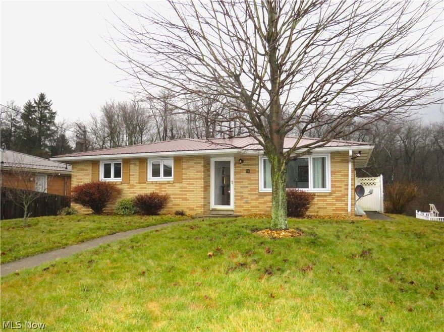 ONE STORY YOU'LL LOVE!!  Well loved 4 bedroom, 2 bath brick ranch home located on Highland Hills.  Features include a welcoming living room, equipped eat-in kitchen, 3 bedrooms, full bath and enclosed sun room on the main level.  The lower level offers a 4th bedroom and bath with walk in shower.  The extra bonus of a 3 car garage (2 with 10' garage doors) is a rare find.  New hot water tank, central air, replacement windows and more!