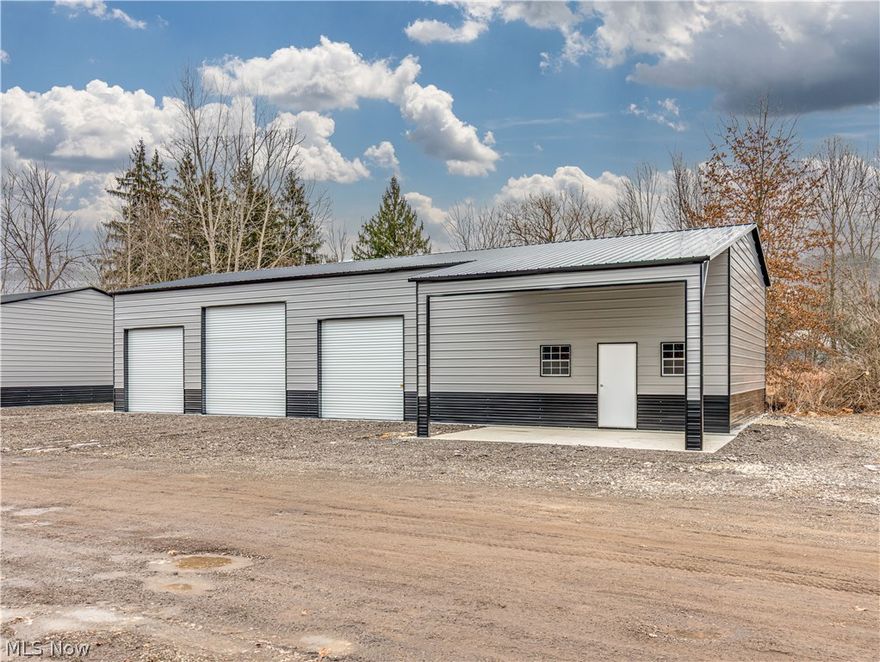 Unique opportunity to lease a brand-new 70x30 fully insulated building featuring three manual overhead doors (one 12'x12' and two 10'x10'). 5 buildings available.  Ideal for HVAC, landscaping, plumbing, electrical, or any business needing secure storage and workspace. Each unit offers a 6" concrete floor, 100-amp electrical panel with 220 outlet, and a covered entrance with concrete pad. Ample additional outdoor parking and a highly convenient location just 4 minutes from I-77.