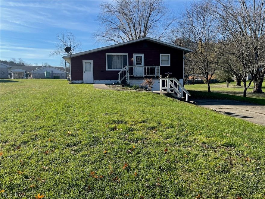 Convenient South Parkersburg location!! Currently was used as a rental property would make a terrific investment opportunity with the extra lot and the utilities already in place or plenty of space to build a garage. 3 bedrooms, full bath. living room, family room, & lots of storage space throughout. Small carport, 1 car garage attached, storage building and hardwood flooring under carpet. Lots of potential & located close to schools & shopping!