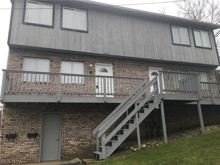 Spacious duplex with many amenities. Just like a home, spacious living area with huge eat in kitchen. Appliances included. Two huge bedrooms on the upper level with full bathroom. One car garage, private laundry and storage area, nice yard.