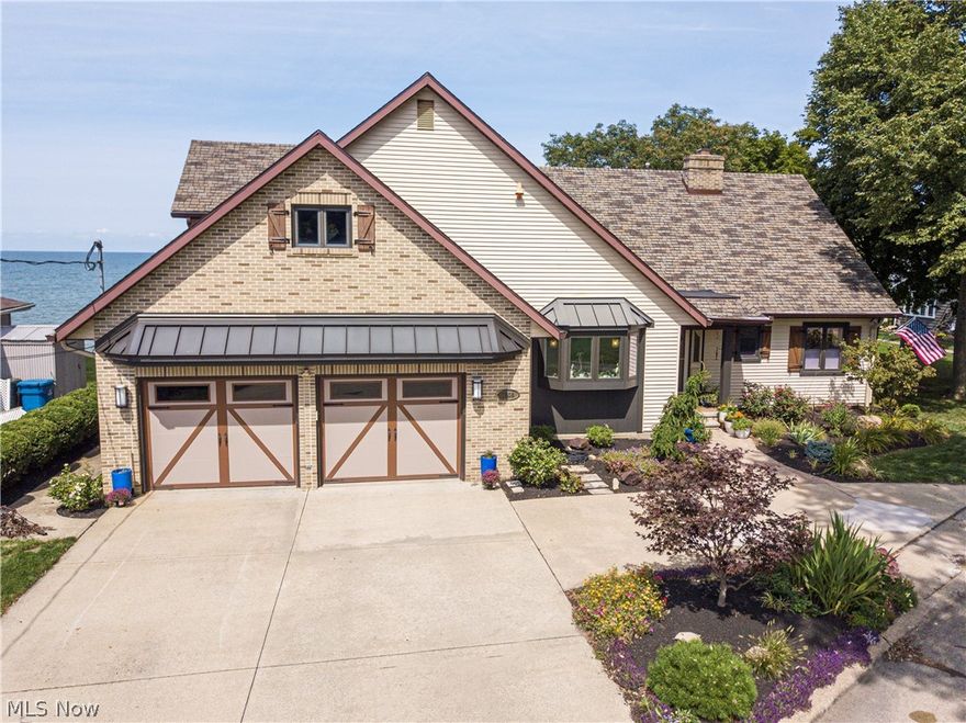 This breathtaking lake front home has been meticulously renovated throughout by local custom builder. Magnificent attention to detail on every inch of property, this 3 bedroom 4 bathroom home has it all. Upon entering the large foyer you will immediately be drawn to the panoramic lake views. The huge family room boasts large windows, brand new hardwood flooring and a sandstone gas fireplace. Off the family room you will find a grand dining area to fit any size gathering. Step into every chef's dream kitchen, with top of the line stainless appliances and custom one off granite counter tops. The island is equipped with a custom made butcher block top. The first floor also features a giant master bedroom overlooking the lake, fall asleep to the waves rolling to the shore. Upstairs you will find 2 large guest bedrooms overlooking the lake, a large sitting/recreation area and behind the beautiful french doors an office with custom wood finishes. Head out back through the large 4 season room