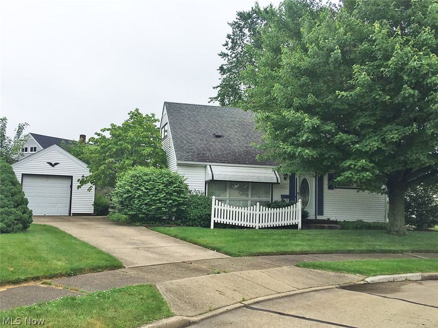 Cozy four bedroom bungalow with one car garage. Home offers applianced kitchen, dining room with access to covered rear deck, living room, two bedrooms and full bath. Second level offers two additional bedrooms. Full block partially finished basement with bar. Modern gas furnace and central air. Convenient location!