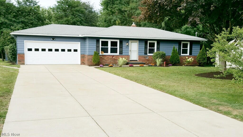 Are you looking for a house with updates and modern amenities? Look no further. This quaint Ranch sits on a little over 1/2 an acre and has been totally redesigned starting with a bright new open kitchen with stainless appliances and Laminate wood flooring carrying you into the large family room. New double hung/double pain windows are found throughout. Tiled shower & flooring in main bathroom with granite sink top. The enlarged first floor bedrooms have bigger closets and space now for comfort with plenty of light. The finished basement with 2 additional bonus rooms and entertainment area add to the size of this house. Great views and entertainment welcome you in the 39x11 Sun room off the back kitchen and has been properly insulated/vented for heat/cooling, and finished with beautiful ceramic tile for year round fun. Other new updates include electrical, GE electronic Water Softener, Rheem hot water tank, Chamberlain garage door opener, pull down stairs in garage for extra storage, E